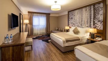 Superior Quadruple Room | Minibar, in-room safe, desk, free cribs/infant beds