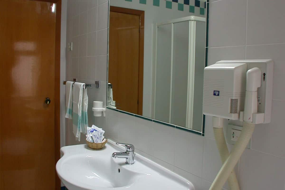 triple room | bathroom | rainfall showerhead, free toiletries, hair dryer, bidet