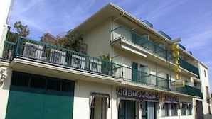 A two-story building with a sign reading "HOTEL" and "RISTORANTE" indicating a restaurant on the ground floor. - Hotel La Pergola (Rionero in Vulture)
