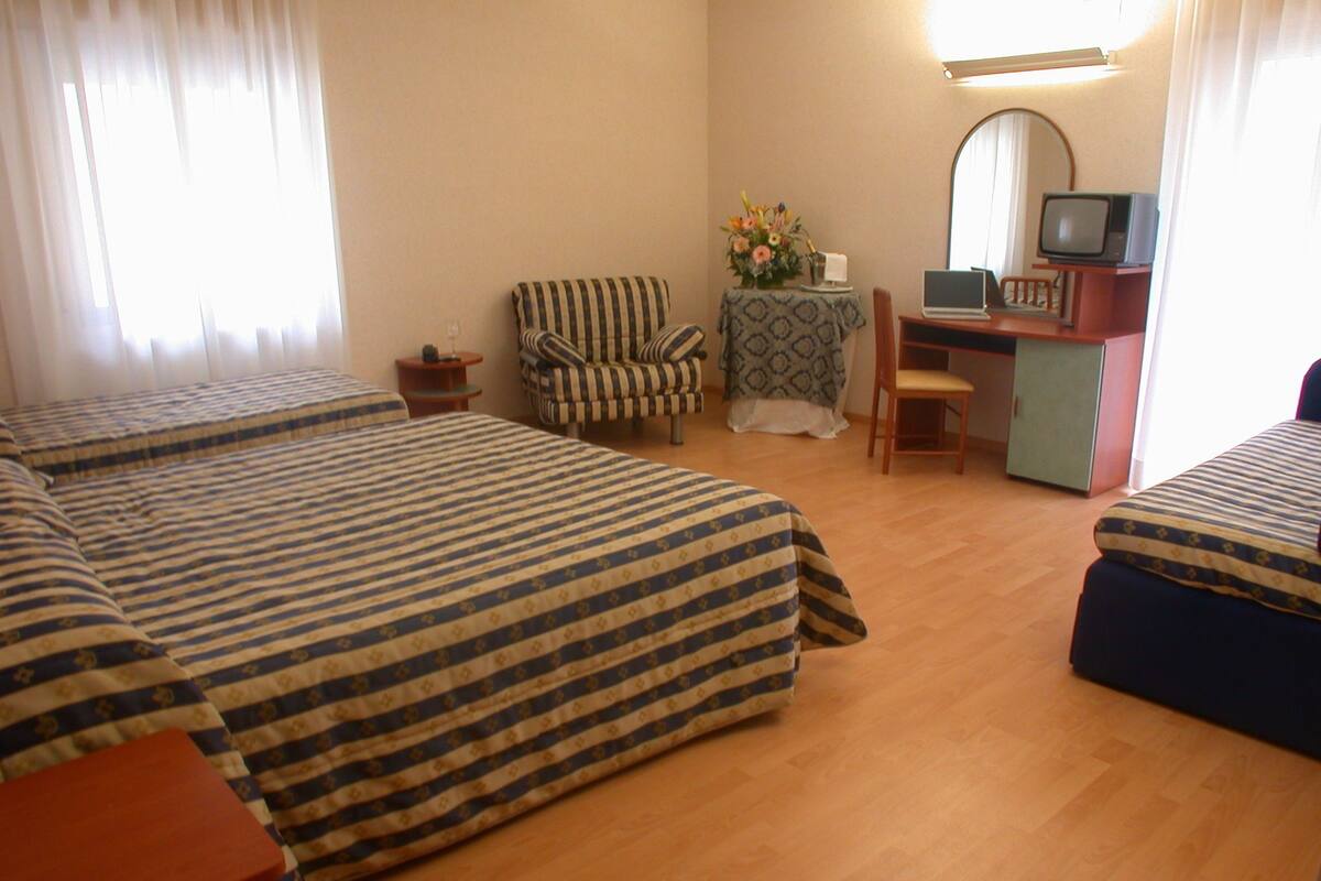 Vierbettzimmer | Italienische Bettbezüge von Frette, hochwertige Bettwaren
