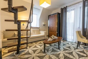 Chambre Double Deluxe | Coin séjour