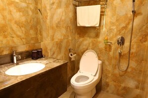 Shower, free toiletries, hair dryer, towels