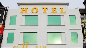 The exterior of the Golden Valley Hotel with a prominent 'HOTEL' sign and a large entrance. - Golden Valley Hotel (Malacca City)