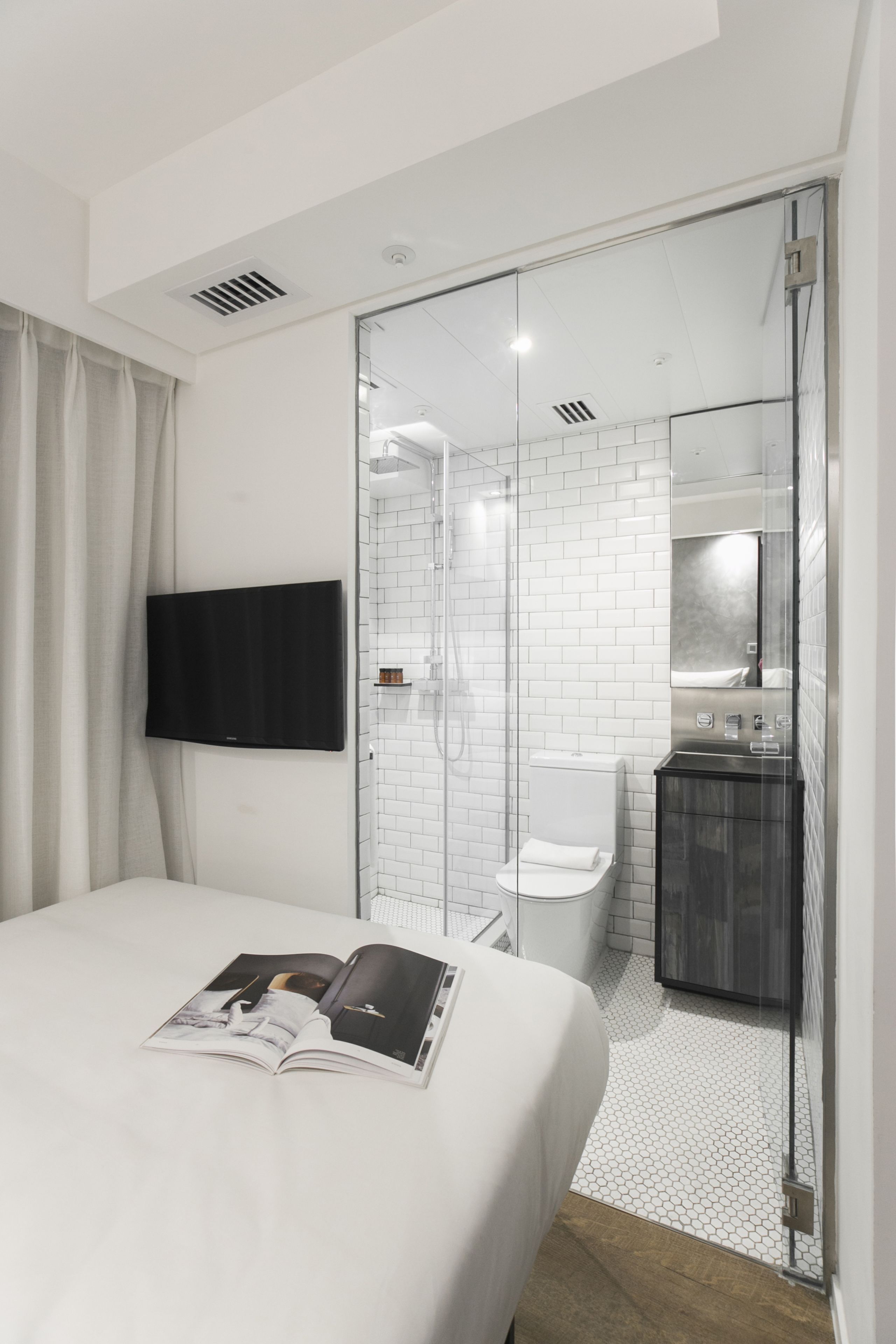 Premium bedding, down comforters, pillowtop beds, in-room safe