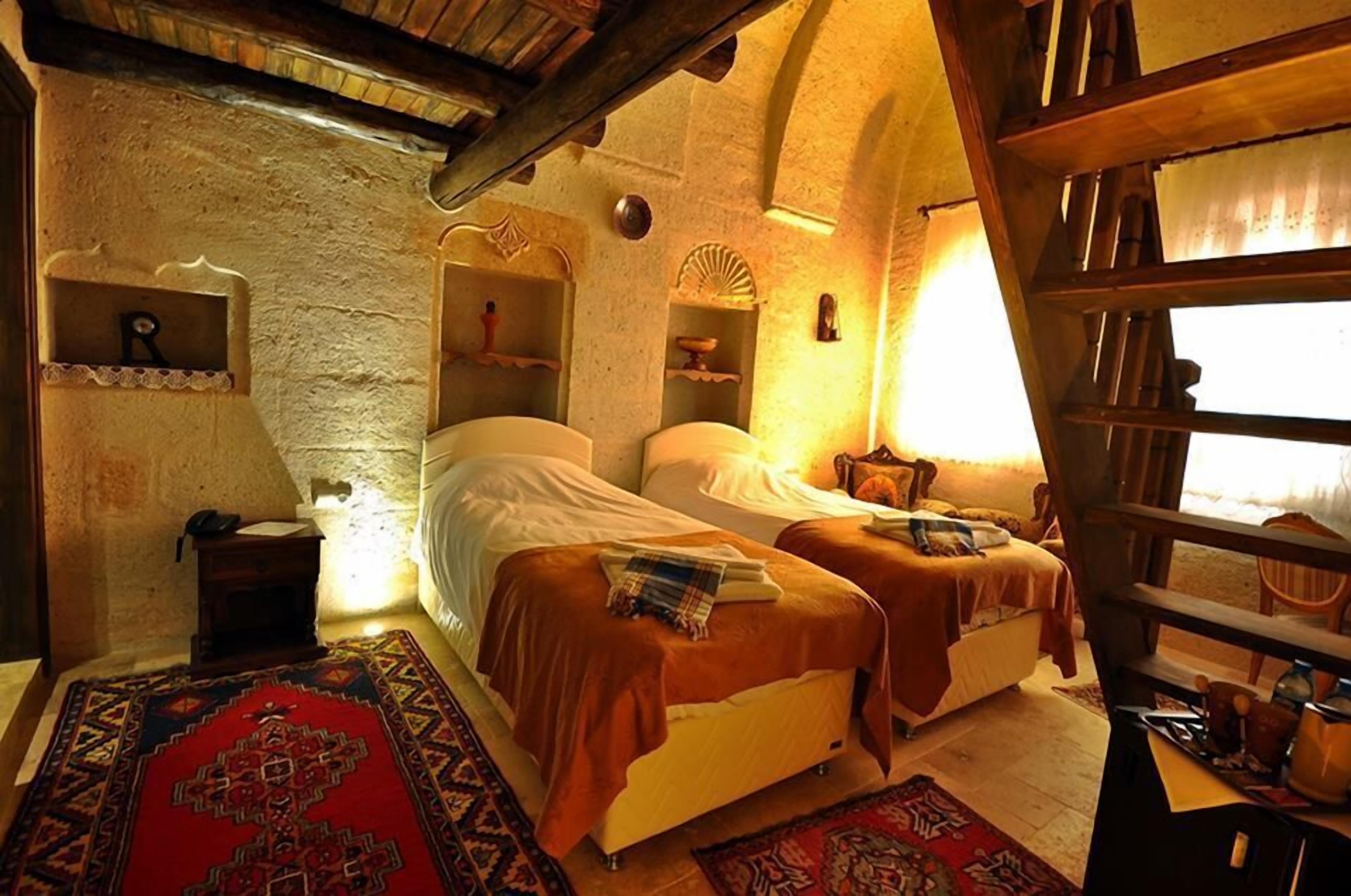 deluxe quadruple room, 1 bedroom, non smoking, courtyard view | premium bedding, minibar, in-room safe, free wifi