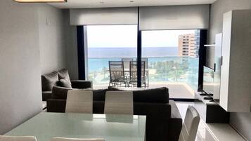 Apartment, 2 Bedrooms, Terrace, Sea View | Living room | Flat-screen TV