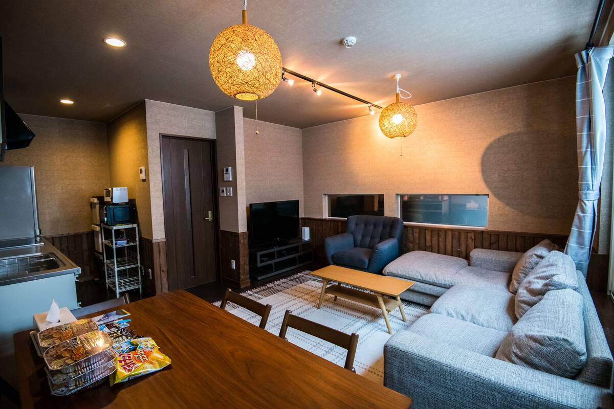 Apartment, 3 Bedrooms | Living area | 30-inch LCD TV with cable channels, TV