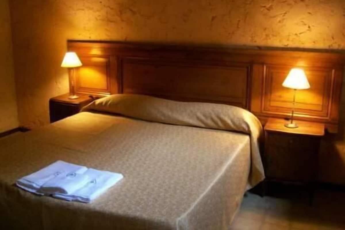 Premium bedding, down comforters, desk, laptop workspace
