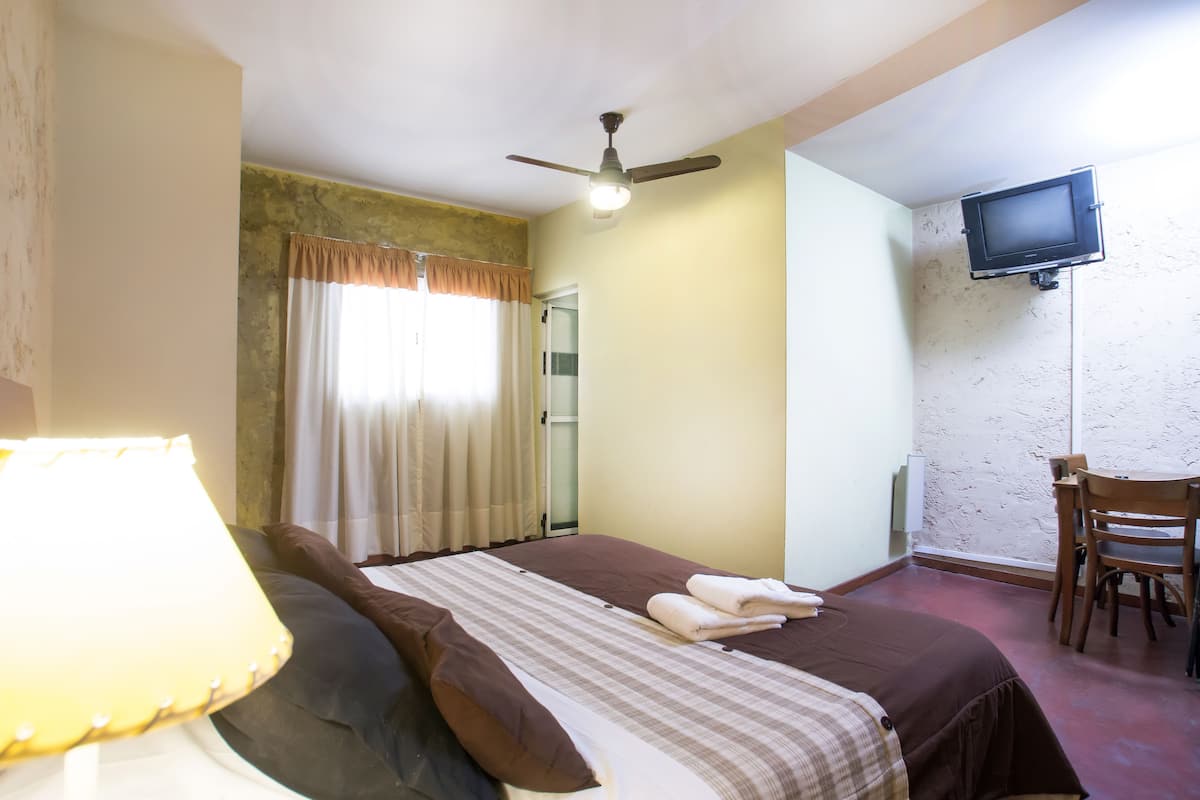 Premium bedding, down comforters, desk, laptop workspace
