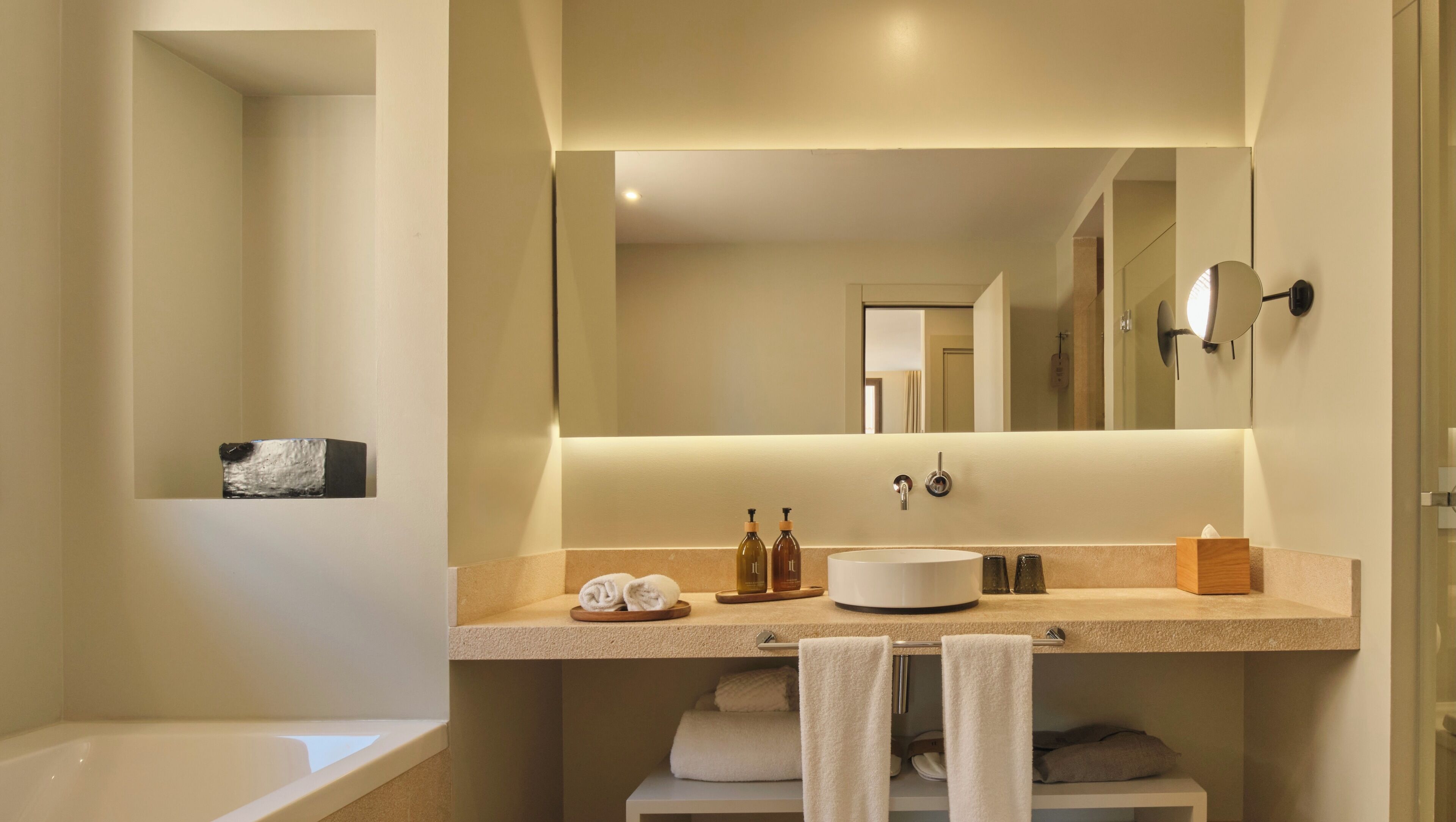 junior suite, 1 king bed | bathroom | designer toiletries, hair dryer, bathrobes, slippers