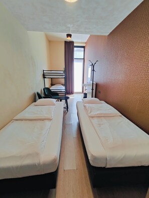 Family Quadruple Room, Shared Bathroom | In-room safe, free WiFi