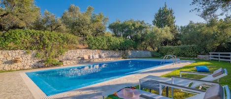 Outdoor pool, pool umbrellas, sun loungers