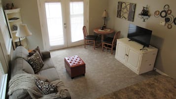 Cabin, 2 Bedrooms | Living area | Flat-screen TV