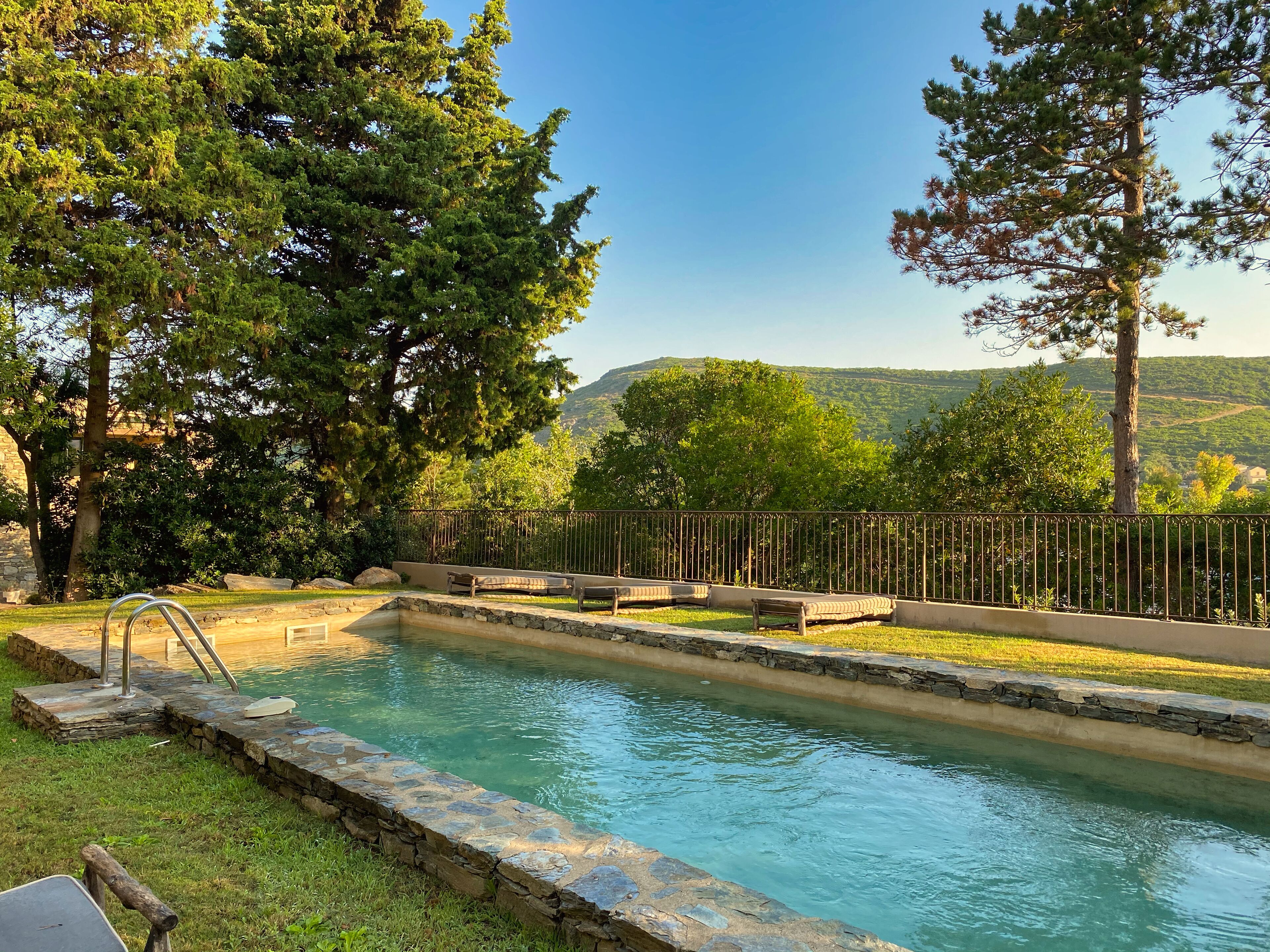 indoor pool, outdoor pool, pool umbrellas, pool loungers