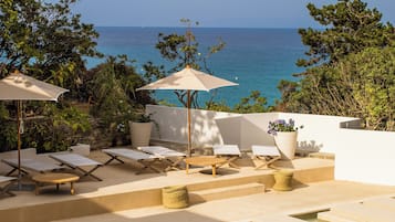 Indoor pool, outdoor pool, pool umbrellas, pool loungers