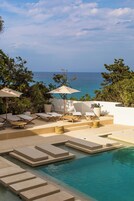 Indoor pool, outdoor pool, pool umbrellas, sun loungers