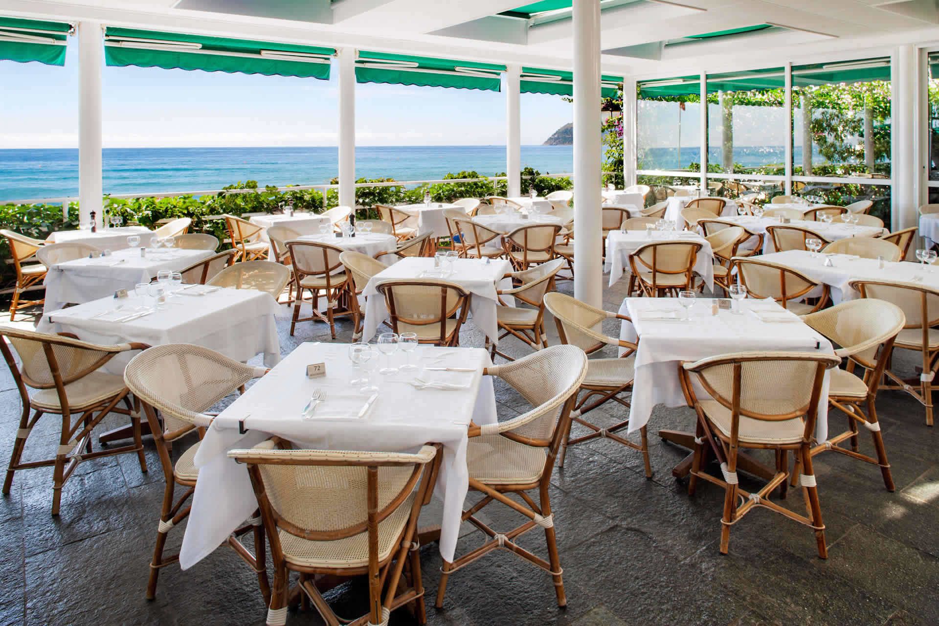 Breakfast, lunch, dinner served; beach views