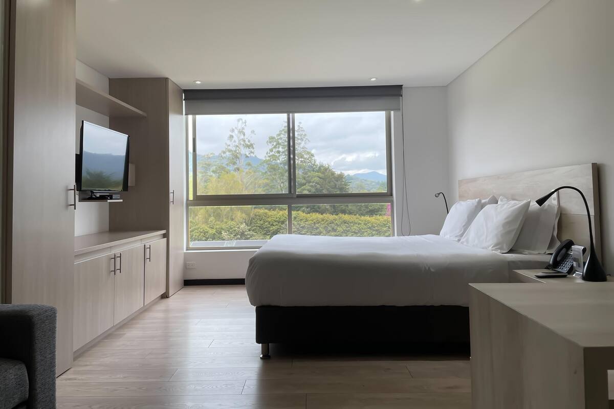 In-room safe, desk, blackout curtains, iron/ironing board