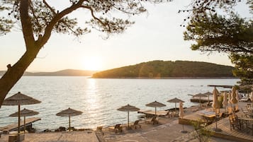 Sun loungers, beach umbrellas, beach towels, beach yoga