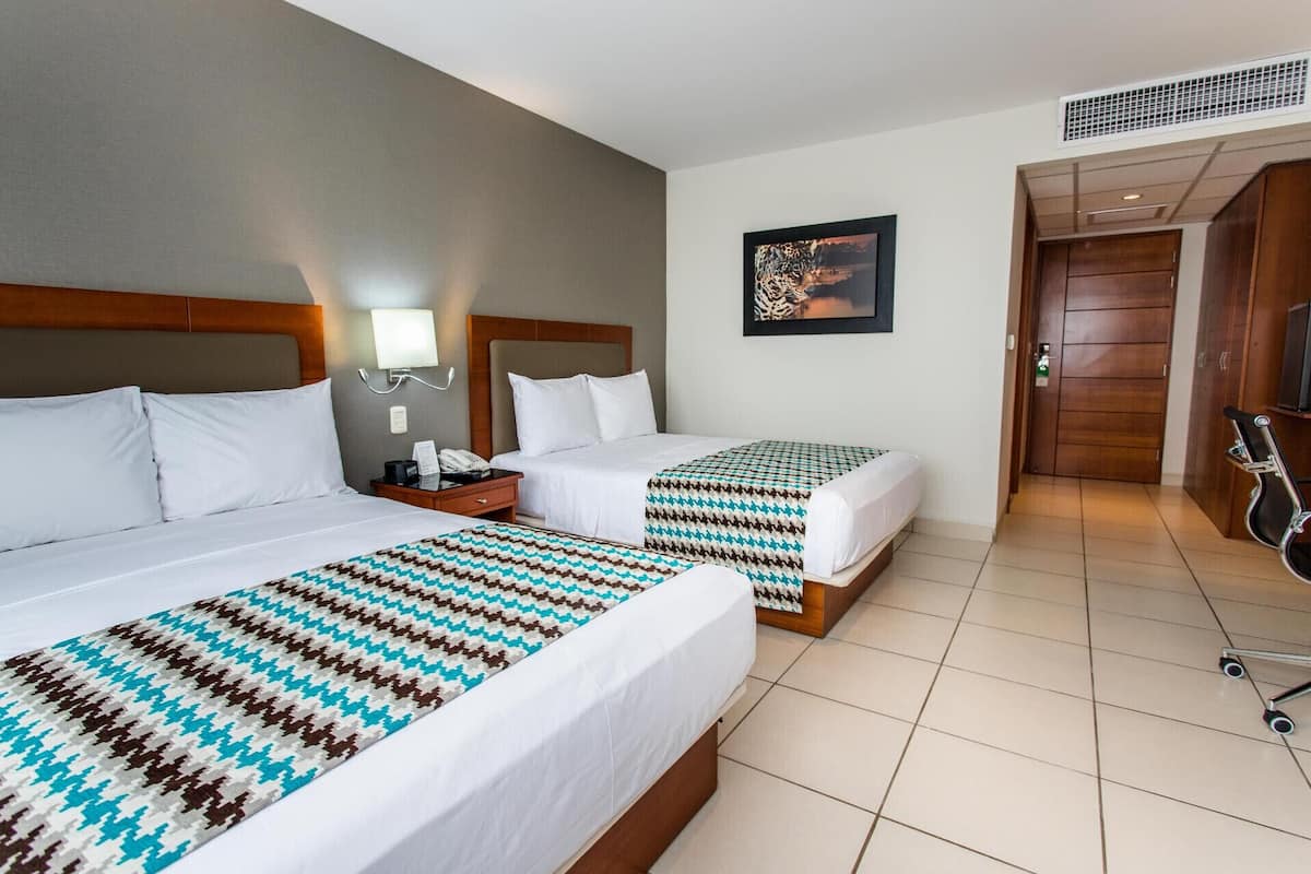 Hypo-allergenic bedding, in-room safe, desk, laptop workspace