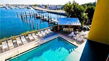 Outdoor pool, pool umbrellas, sun loungers