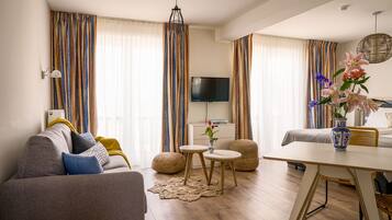 Comfort Studio, Sea View | Living area | Flat-screen TV