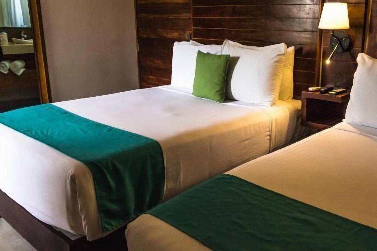 Luxe beddengoed, een kluis op de kamer, een bureau, gratis wifi
