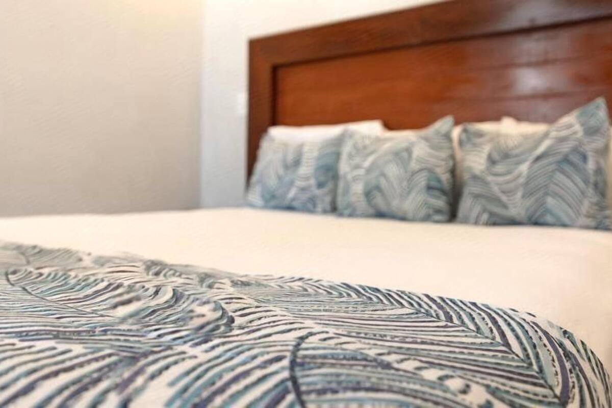 Luxe beddengoed, een kluis op de kamer, een bureau, gratis wifi