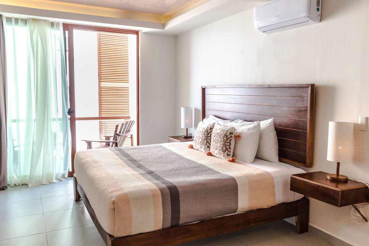 Superior kamer, 1 kingsize bed, gedeeltelijk uitzicht op zee | Uitzicht vanuit de kamer