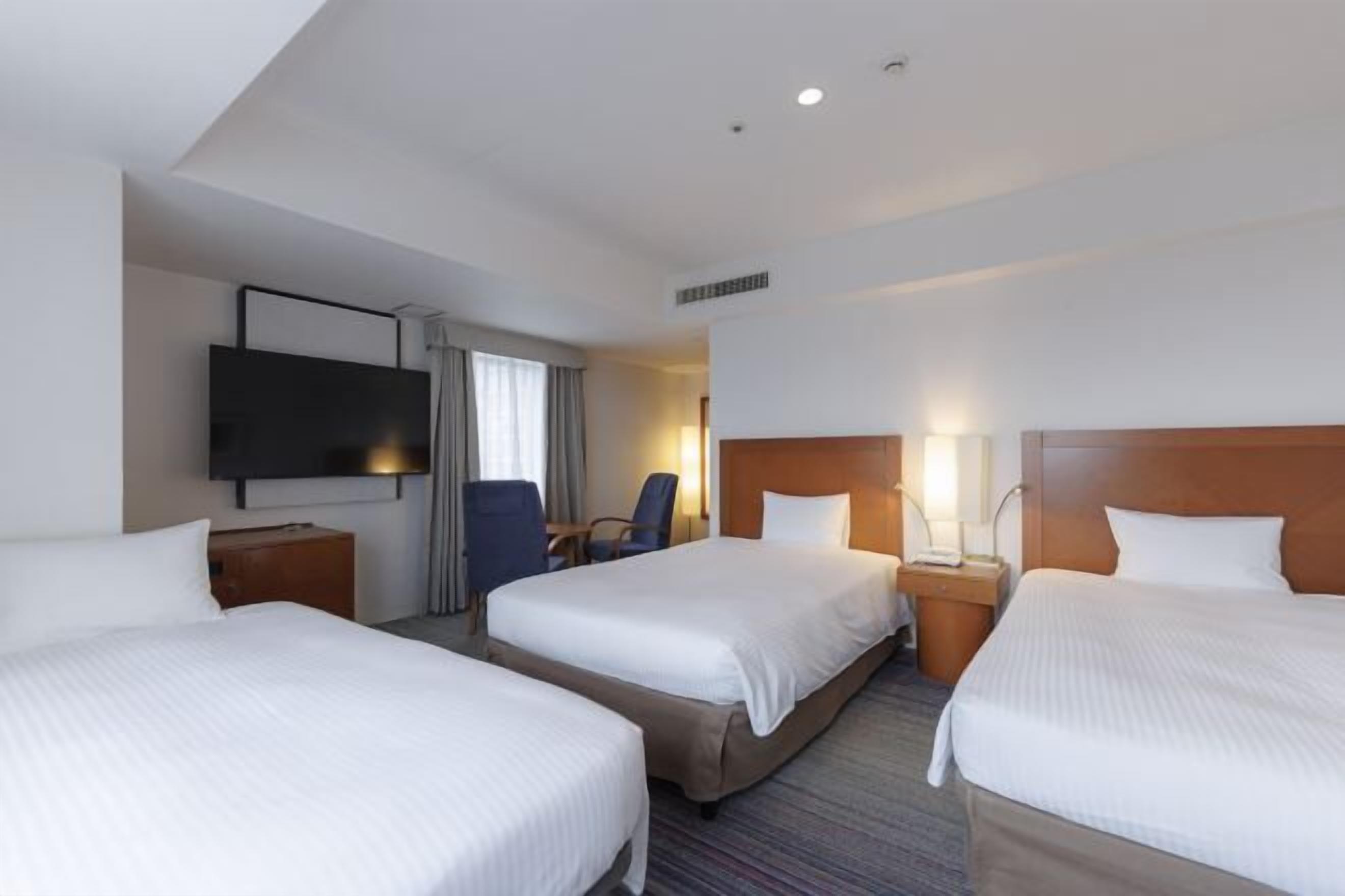 Premium bedding, down duvets, desk, laptop workspace