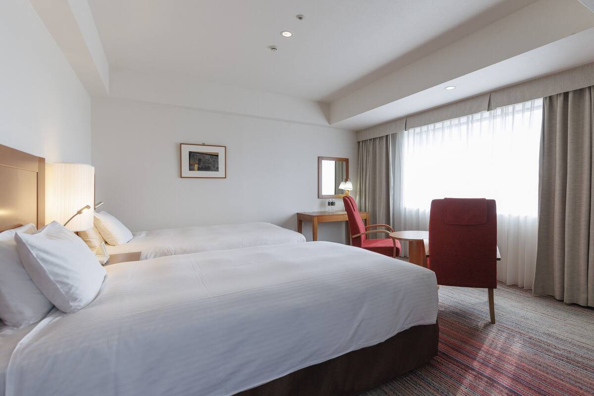 ห้องดีลักซ์ทวิน, ปลอดบุหรี่ | เครื่องนอนระดับพรีเมียม, ผ้านวมขนเป็ด, โต๊ะทำงา  น