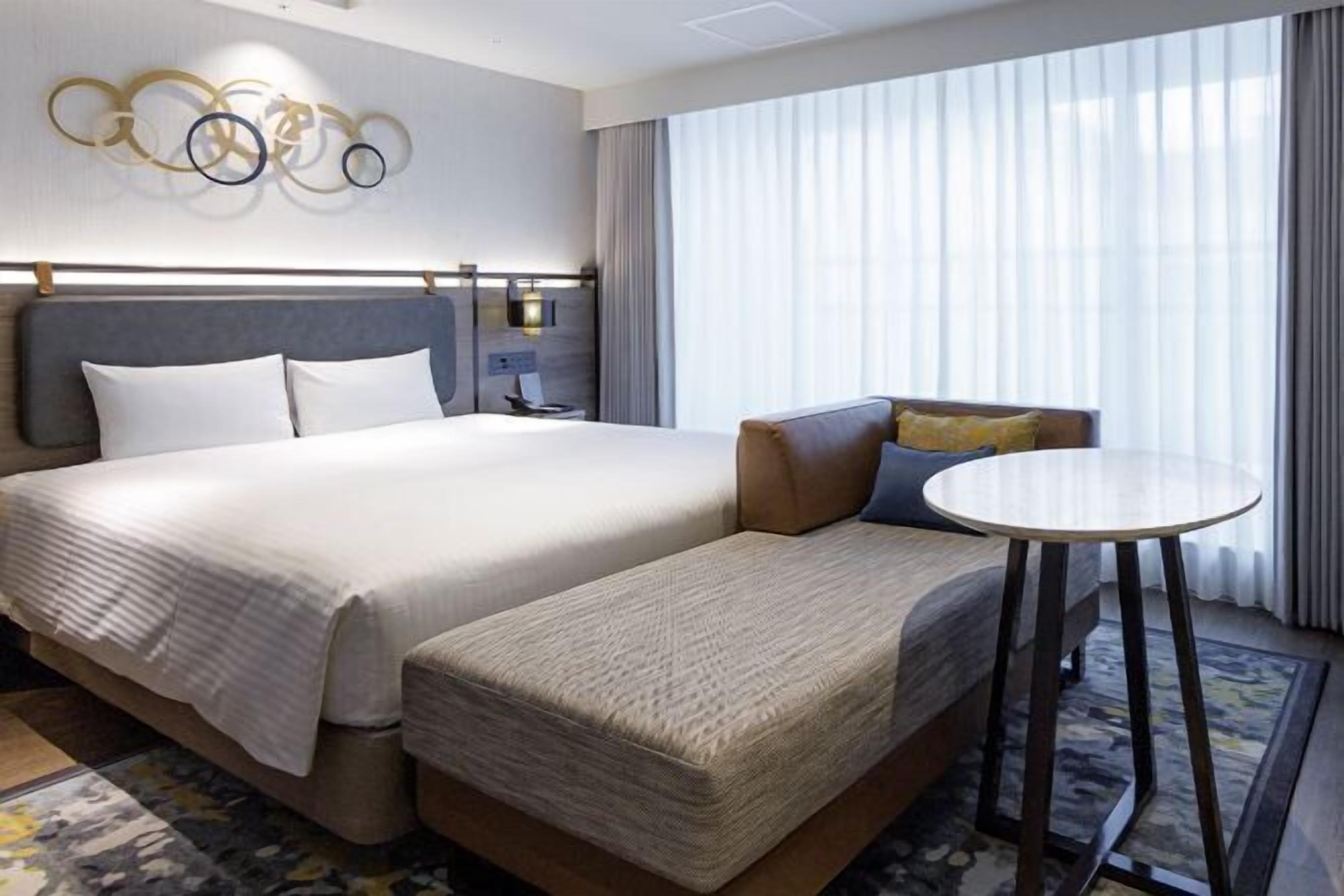 Premium bedding, down comforters, desk, laptop workspace