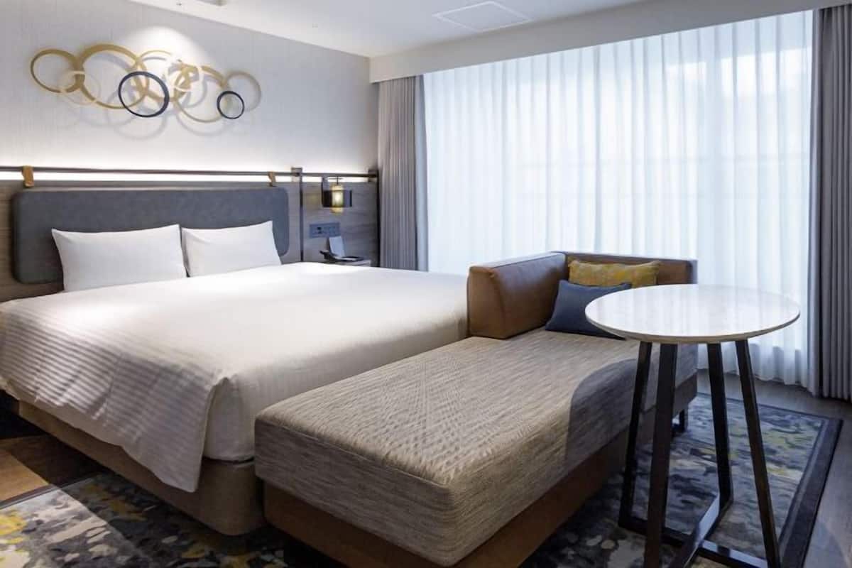 Premium bedding, down comforters, desk, laptop workspace