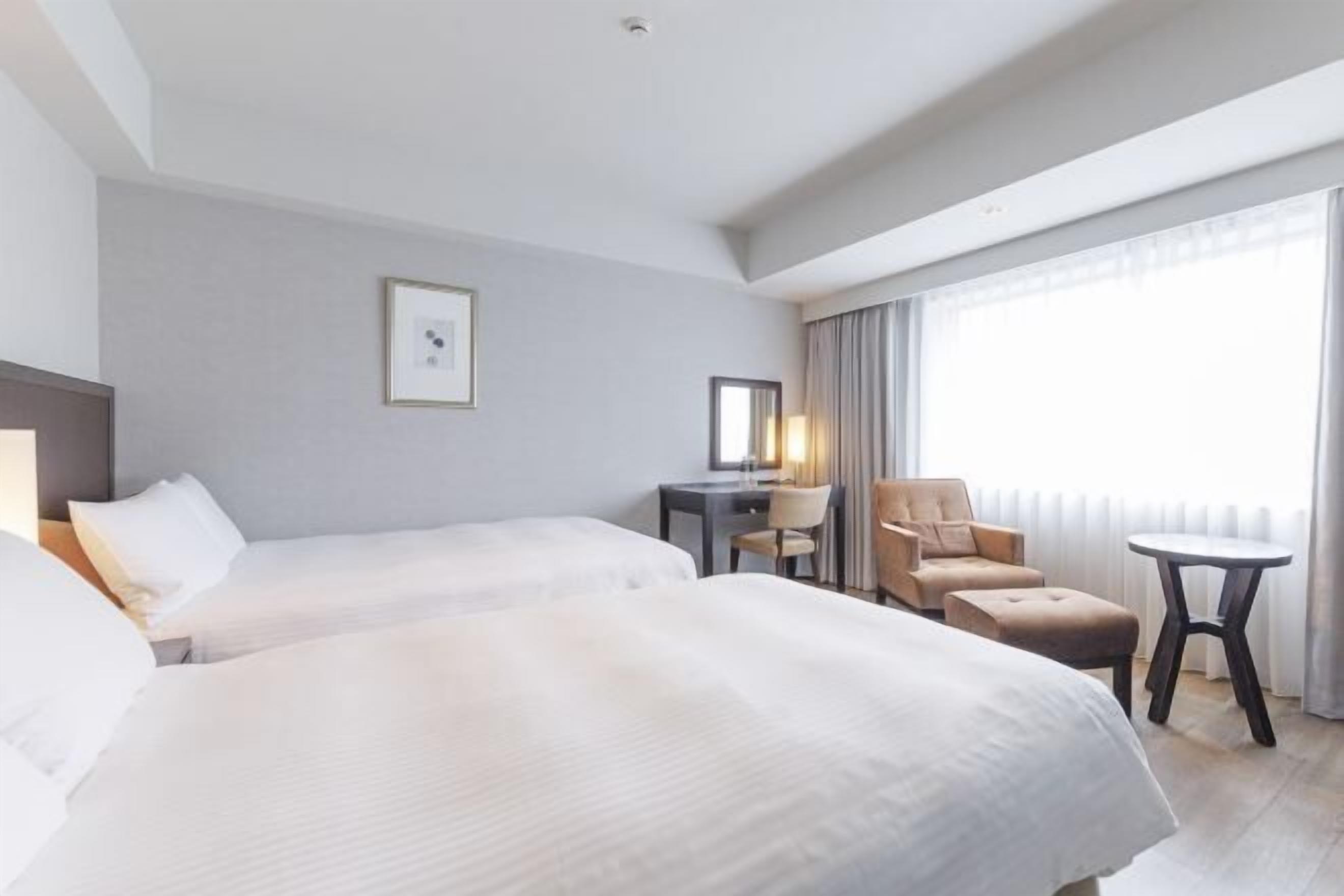 Premium bedding, down comforters, desk, laptop workspace