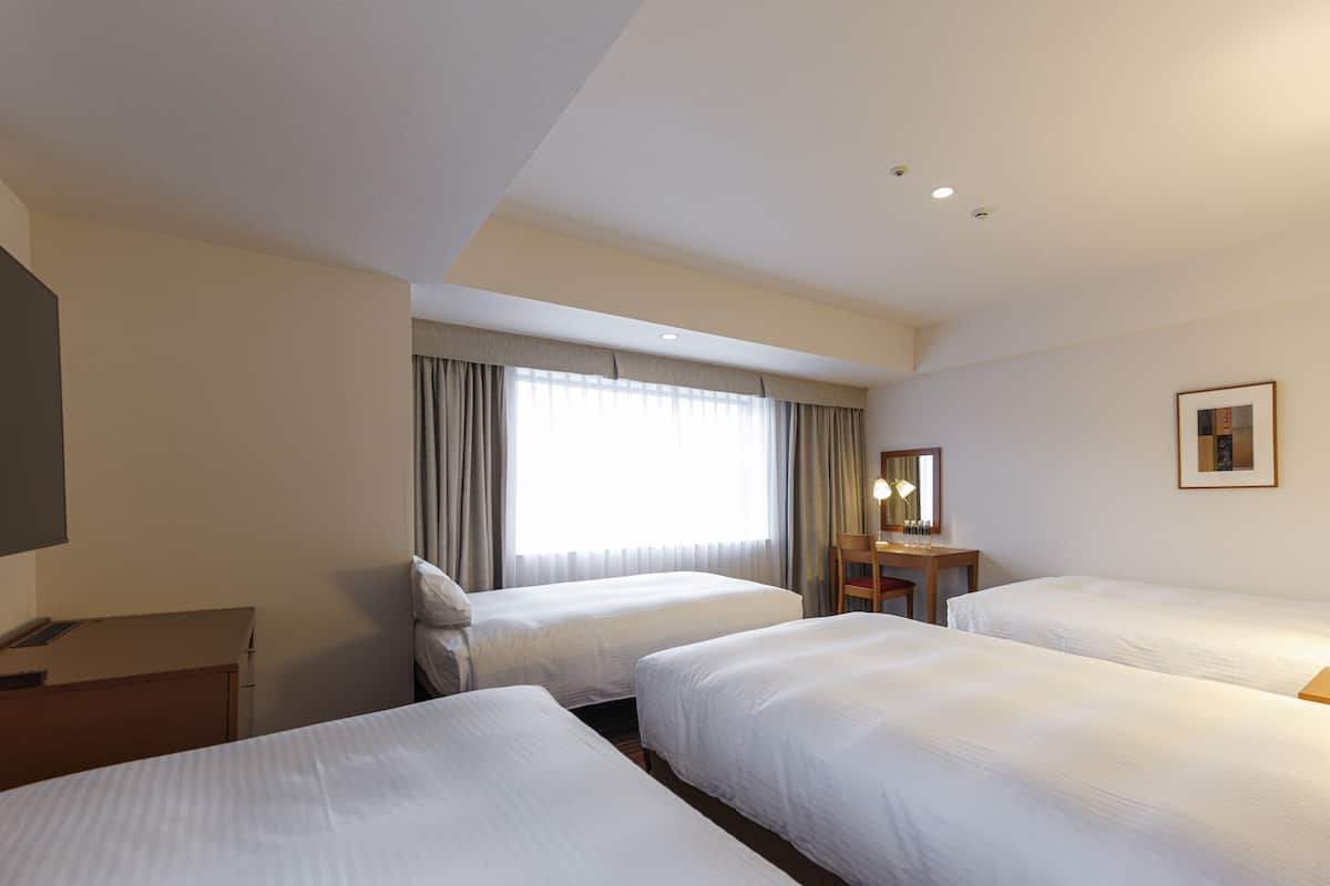 Deluxe Quadruple Room, Non Smoking | Premium bedding, down comforters, desk, soundproofing