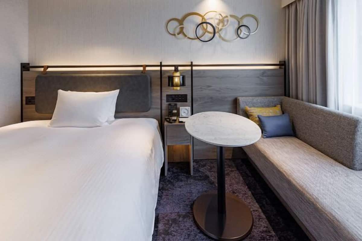 Premium bedding, down comforters, desk, laptop workspace