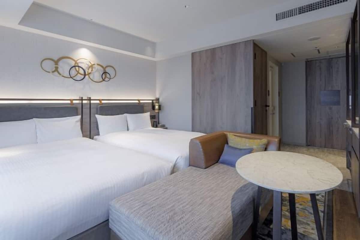 Premium bedding, down comforters, desk, laptop workspace