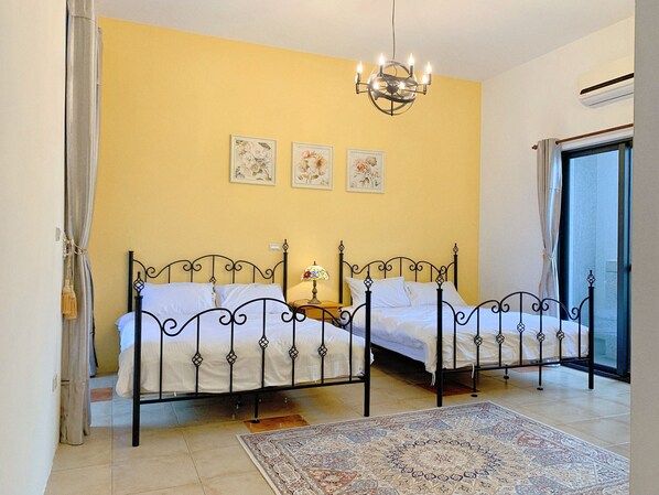 Standard Quadruple Room | Desk, blackout drapes, soundproofing, free WiFi