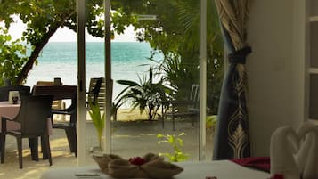 Deluxe Villa, with Beach Front & Snorkeling | 1 bedroom, premium bedding, minibar, in-room safe