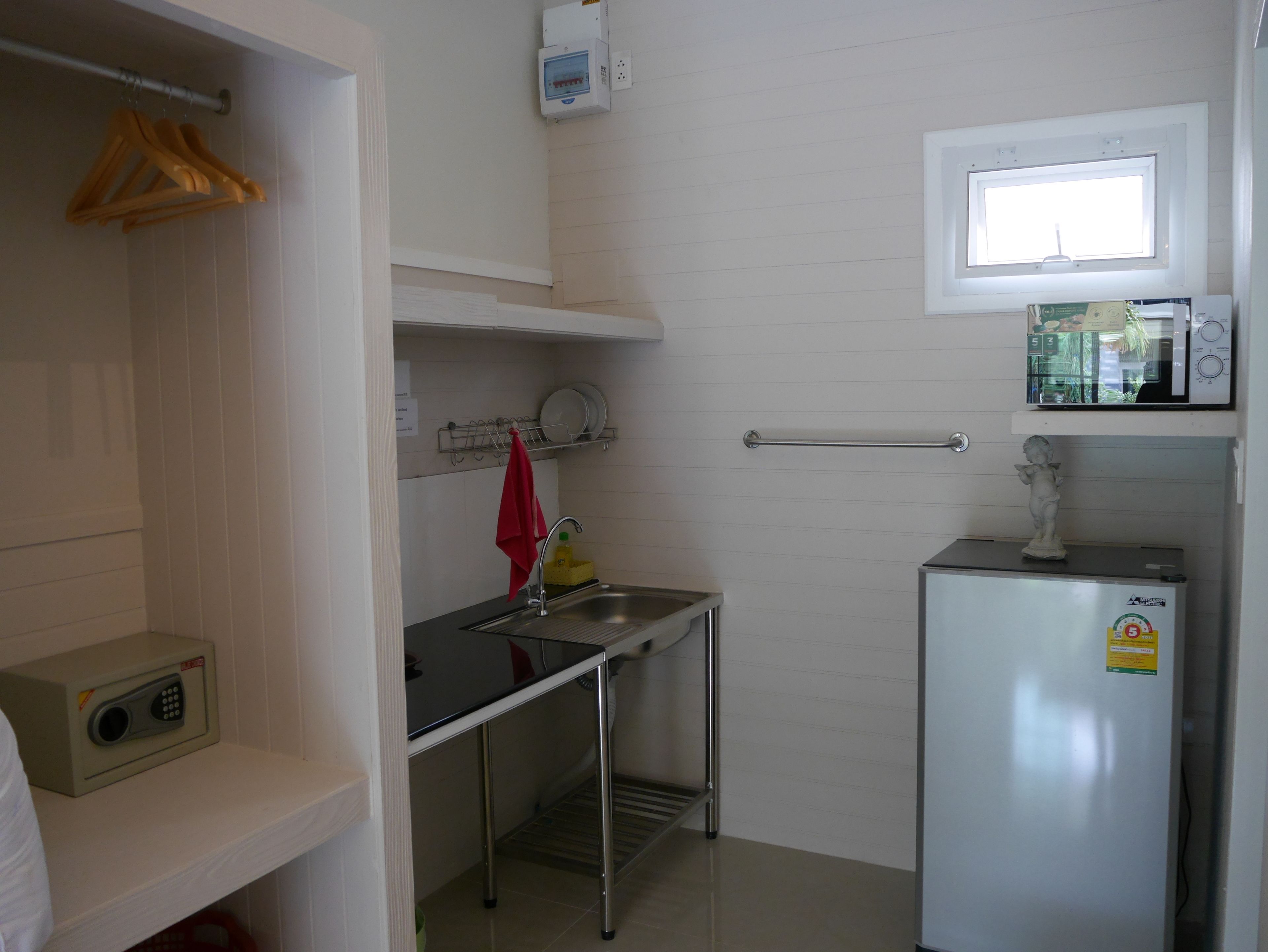 fridge, microwave, electric kettle, cookware/dishes/utensils