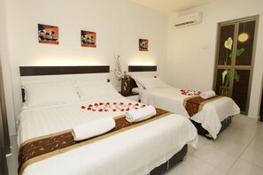Family Room | Desk, iron/ironing board, free WiFi - New Century Hotel (Malacca City)