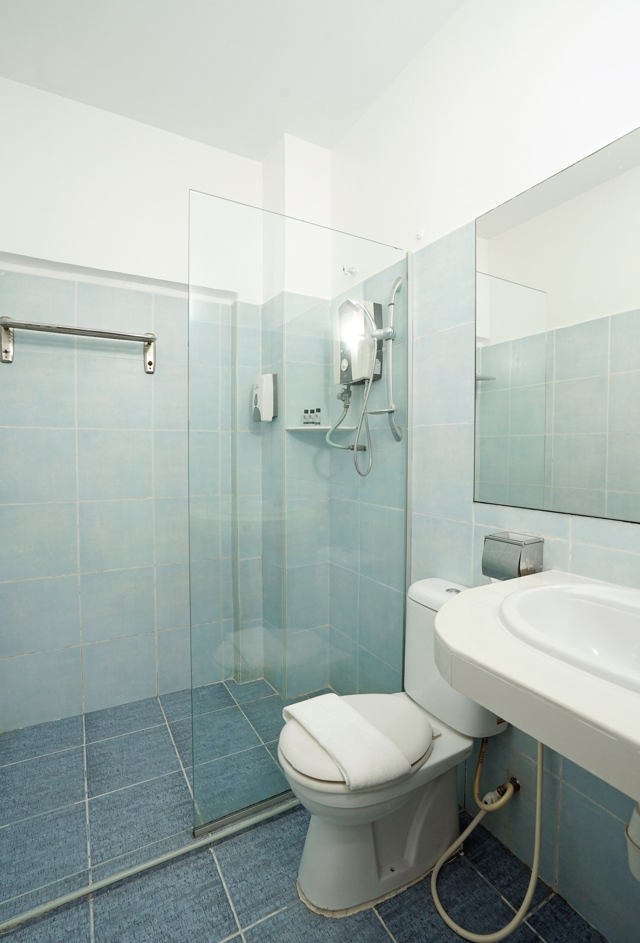 family deluxe room | bathroom | shower, free toiletries, hair dryer, slippers