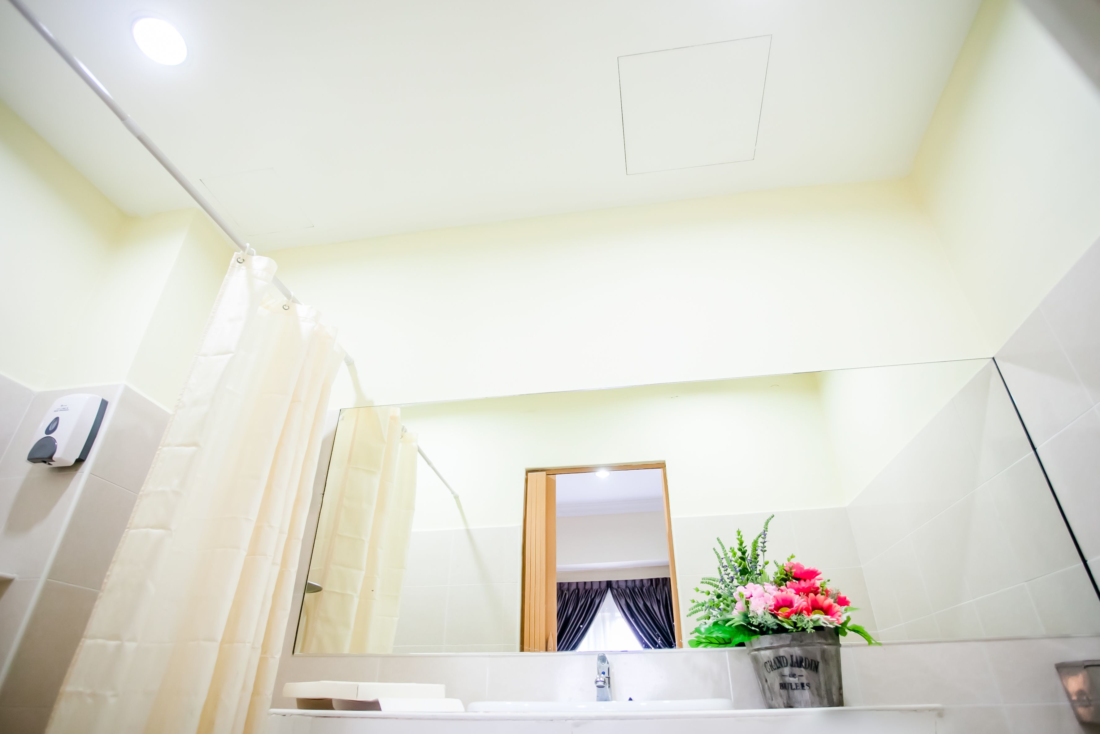 family deluxe room | bathroom | shower, free toiletries, hair dryer, slippers