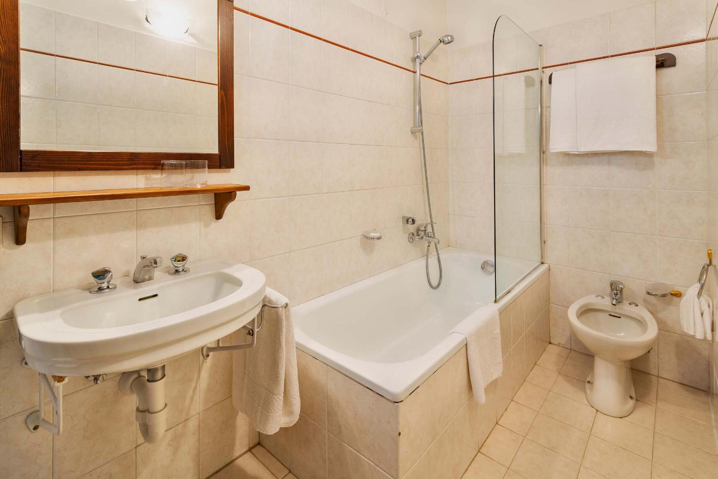 free toiletries, hair dryer, slippers, bidet