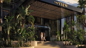A modern hotel entrance with a sign reading "The View." - The View Rabat (Rabat)