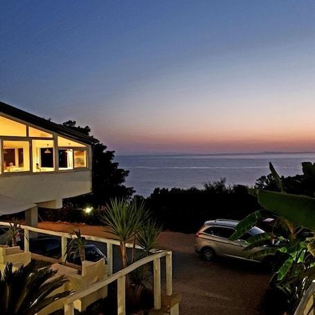 Triple Room, Balcony, Sea View | Minibar, in-room safe, individually decorated, individually furnished