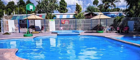 2 outdoor pools, pool umbrellas