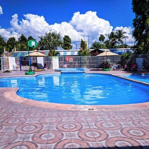 2 outdoor pools, pool umbrellas