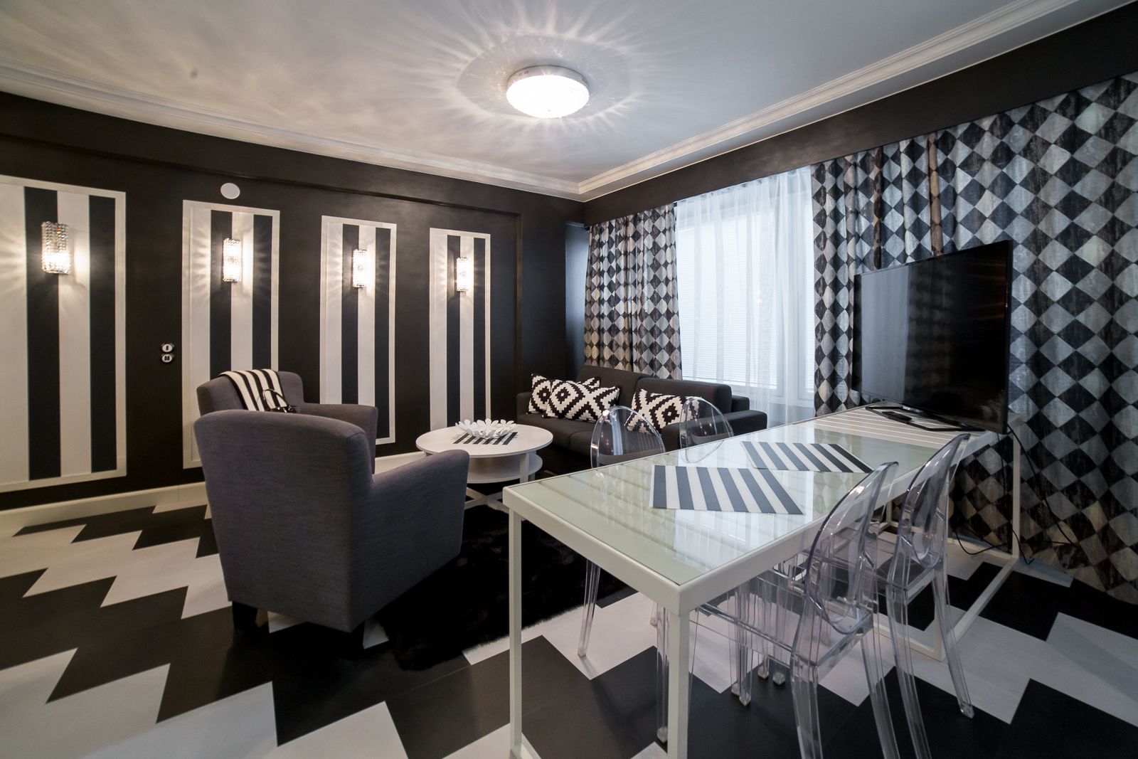 junior suite (double) | living room | flat-screen tv