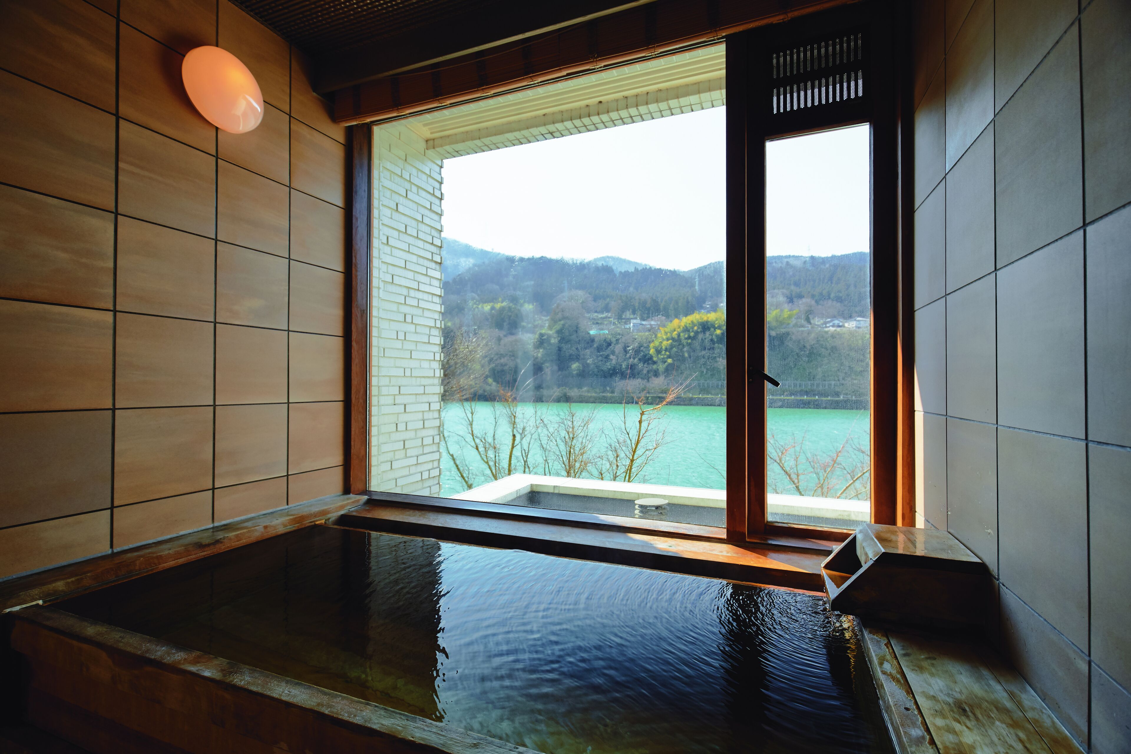 superior suite with hot spring bath, 1 bedroom, non smoking, river view (114) | bathroom | free toiletries, hair dryer, bathrobes, slippers